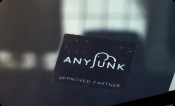 AnyJunk approved partner sticker on window